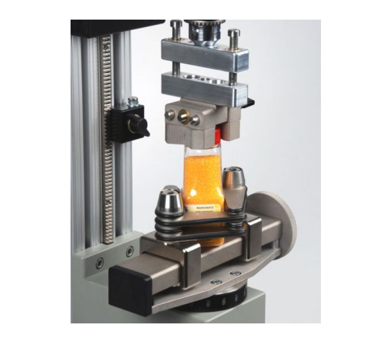 Montaje de prueba con agarre de botella G1023 y agarre de mordaza en V G1053 y compensador axial AC1029.